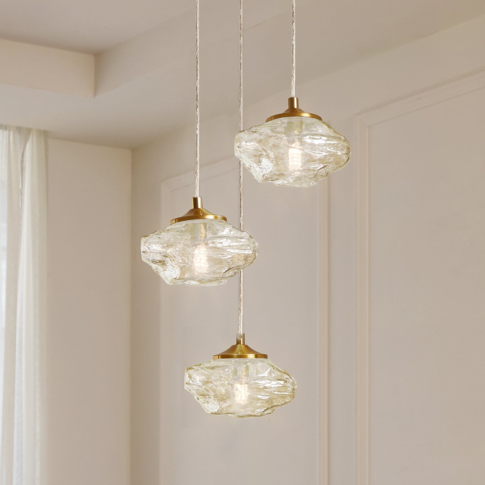 Lindby Hängelampe Piatra Hängeleuchte Deckenlampe Ø25cm 3-flg amber/messing Glas - 4251911796520