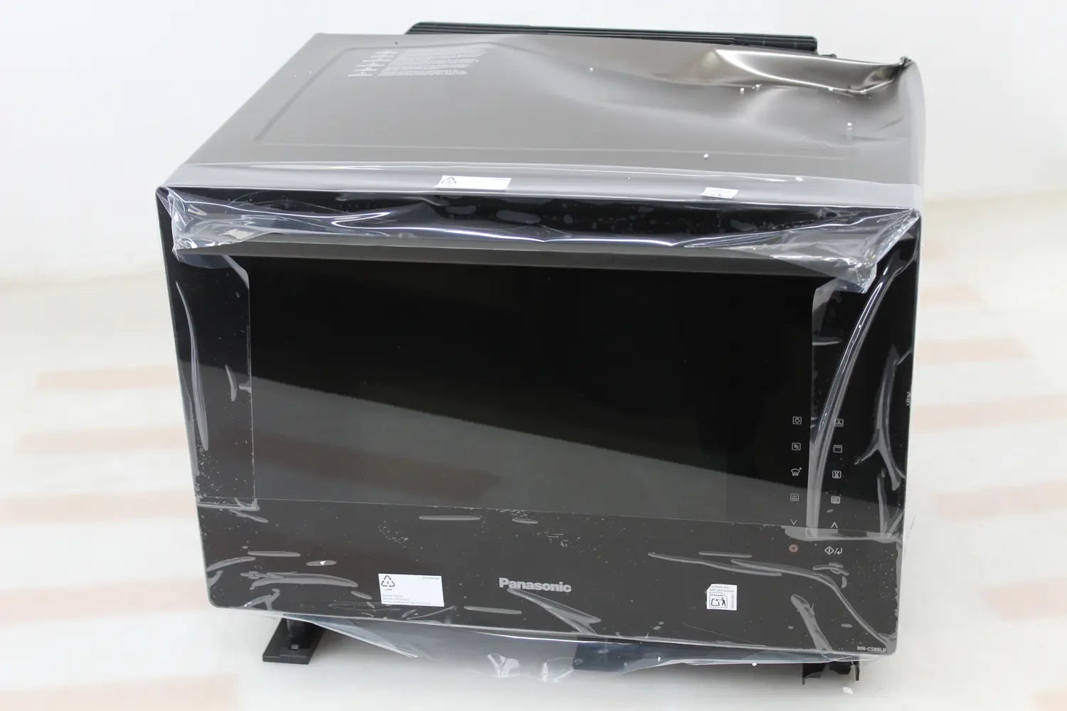 B-Ware Panasonic Mikrowelle Kombimikrowelle Grill Dampfgarer Heißluft 31l Schwarz - 5025232940110