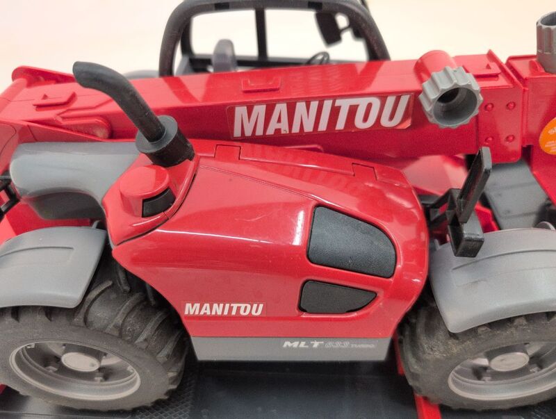 Bruder MAN TGA Tieflader mit Manitou Teleskoplader Modell Baufahrzeug - 4001702027742