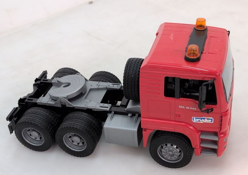 Bruder MAN TGA Tieflader mit Manitou Teleskoplader Modell Baufahrzeug - 4001702027742